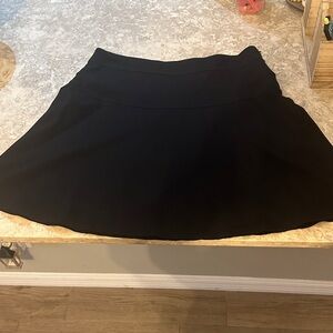 Athleta Black skirt. NWOT. Size 8, side zipper. 15.5 waist, 18.5 length.